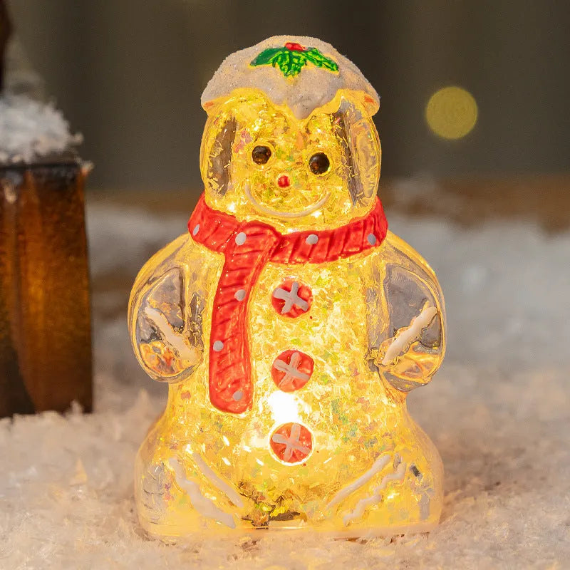 Glowing gingerbread man Christmas ornament with snowman design in plastic construction
