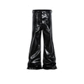Black coated skinny jeans with a shiny patent leather finish and straight leg cut.