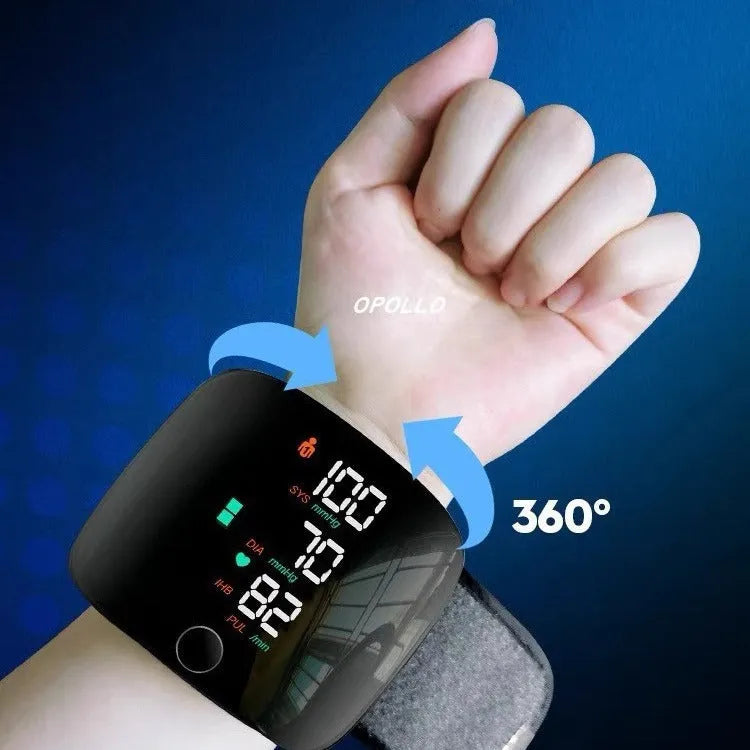 Black wrist blood pressure monitor with USB recharge port and multi-language voice options.