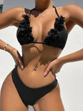 Black polyester two-piece swimsuit set with bikini top and gathered waist shorts.