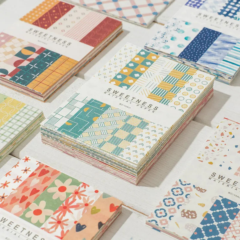 Retro dessert-themed note paper set with 50 small sheets in ten pastel colours including blueberry and caramel.