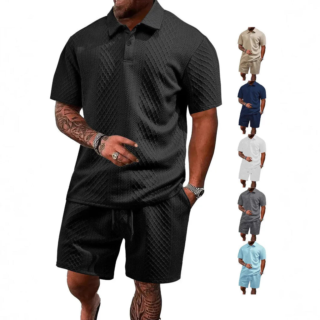Man wearing a light grey thin figured cloth short sleeve polo shirt and trousers from a casual suit set.