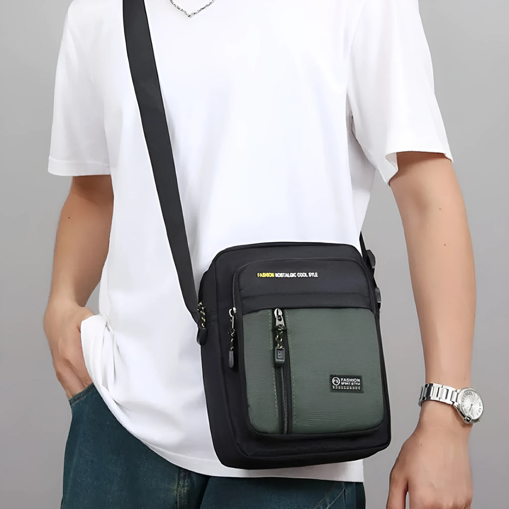 Men's casual outdoor messenger bag in nylon with crossbody strap and sewing thread details