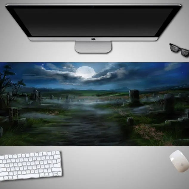 Oversized rectangular Halloween-themed mouse pad on a desk, showing non-slip rubber cloth base.