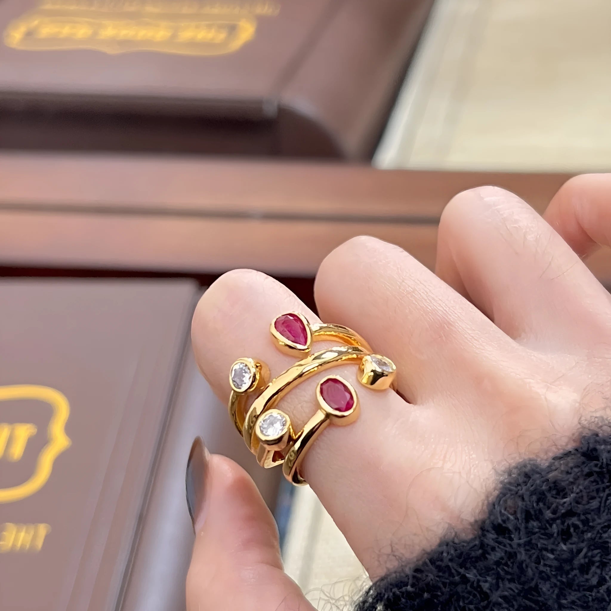 Geometric double-headed diamond ring with irregular cross design in two-tone red and white finish