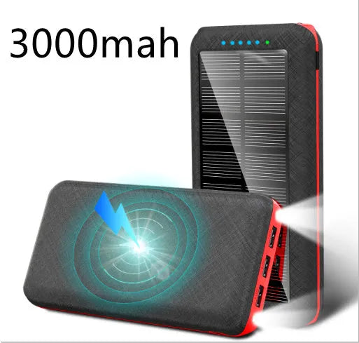 Black solar power bank with wireless Qi charging pad, three USB ports, and an LED flashlight