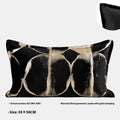Abstract pattern black and gold flannel decorative cushion with removable cover.