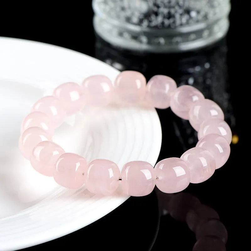 Pink natural crystal bracelet with 11-12mm geometric barrel beads and bamboo-inspired design