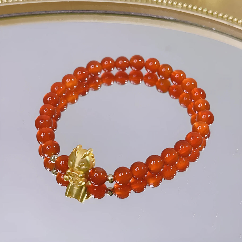 Red agate bracelet for women with dragon motifs and traditional Chinese lucky charms