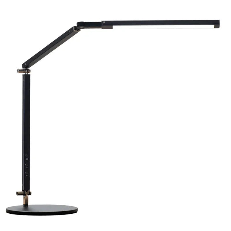 Aluminium clip-on desk lamp with a folding arm and remote control, shown in dazzling black finish.