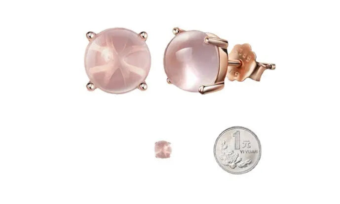 Women's rose gold plated silver earrings with synthetic quartz drop shape design
