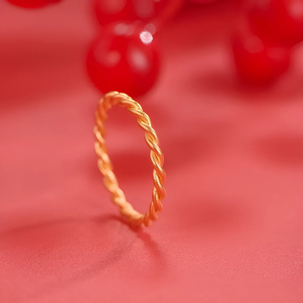 Women's brass gold plated ring shown in simple bracelet and twist ring styles.