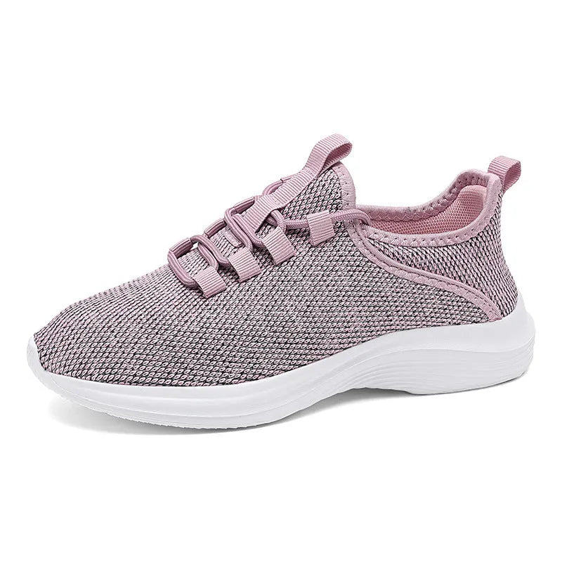 Women's low-top casual sneakers with breathable mesh upper and round toe in black colour