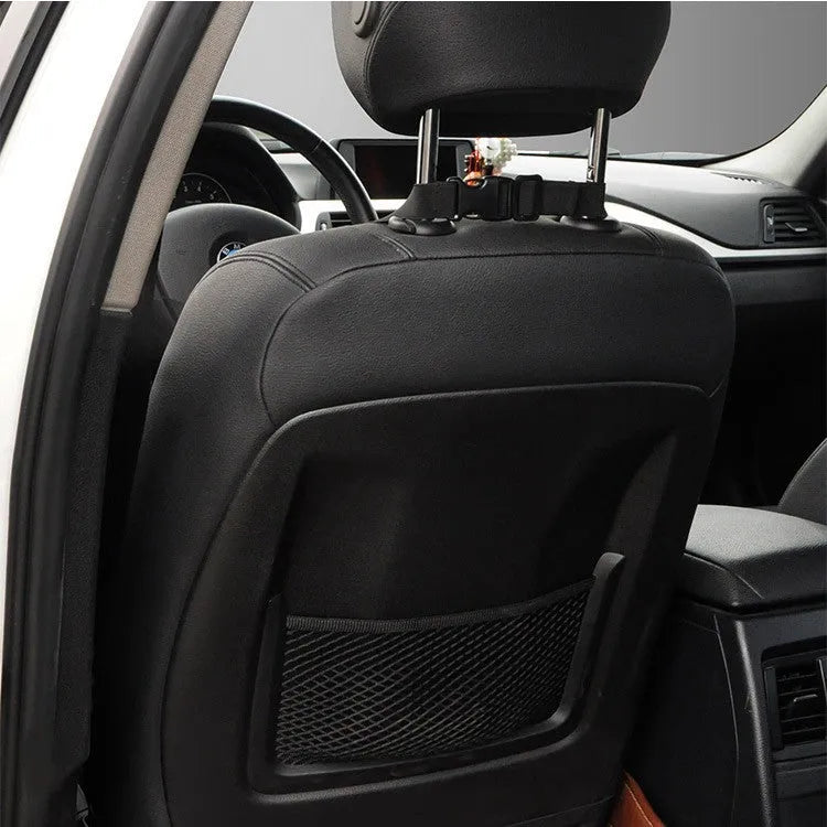 Solid-colour memory foam car lumbar support cushion on a car seat.