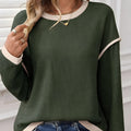 Women's loose fit drop shoulder knit top with contrast trim in beige, four leaf clover, and light pink colours