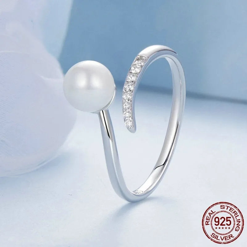 S925 sterling silver ring with shell pearls and open adjustable loop for size 8