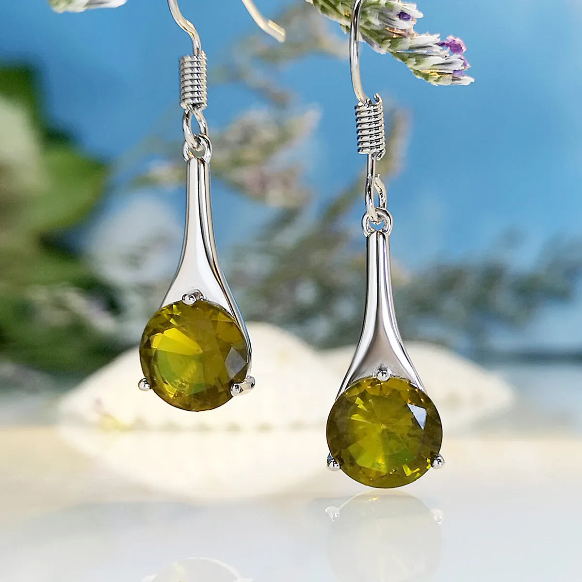 Olive green topaz drop-shaped earrings with retro design on alloy with electroplated finish
