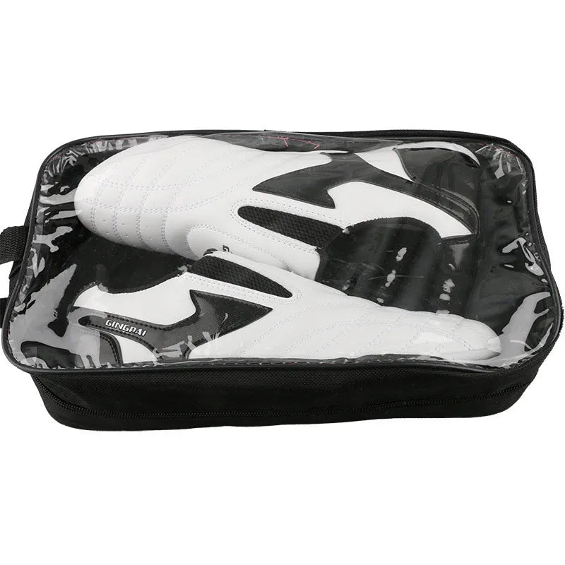 Black and white children's martial arts shoes with soft sole and widened fit for boxing training