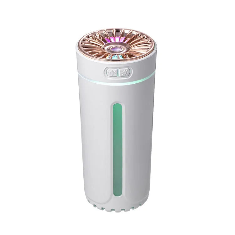 Black portable wireless ultrasonic humidifier with colourful LED lights on a car cup holder.
