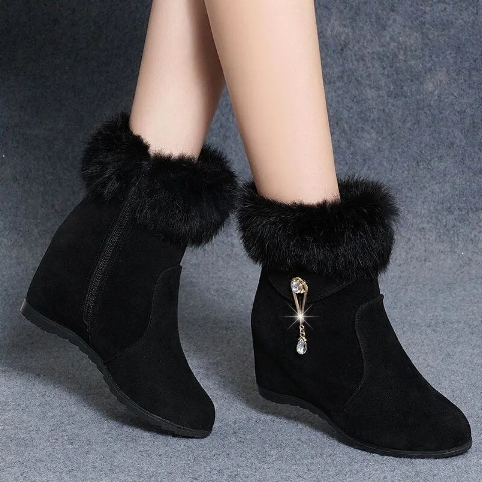Black height increasing insole snow boots for women with fur integration upper and casual design