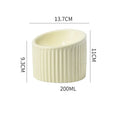 Ceramic elevated cat bowl in green or yellow with a tilted, round, whisker-friendly design.