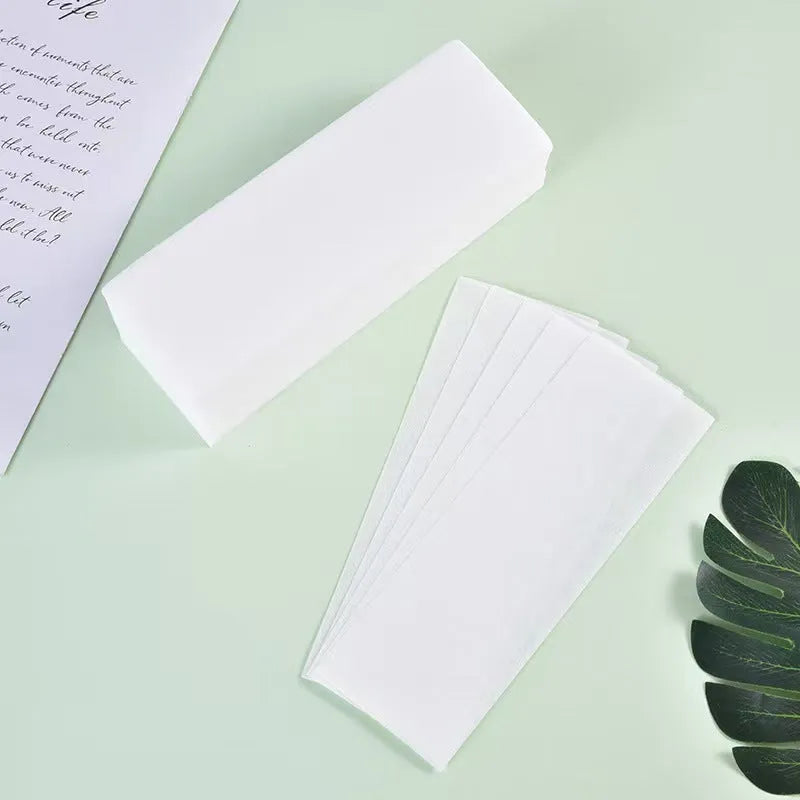 Non-woven fabric wax hair removal strips in disposable packaging for body and facial depilation