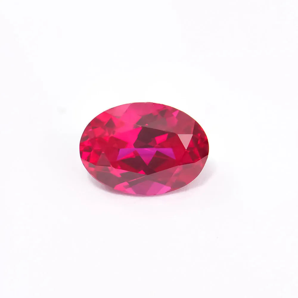 Cultured red ruby gemstone showing pigeon blood red colour in egg shape cut