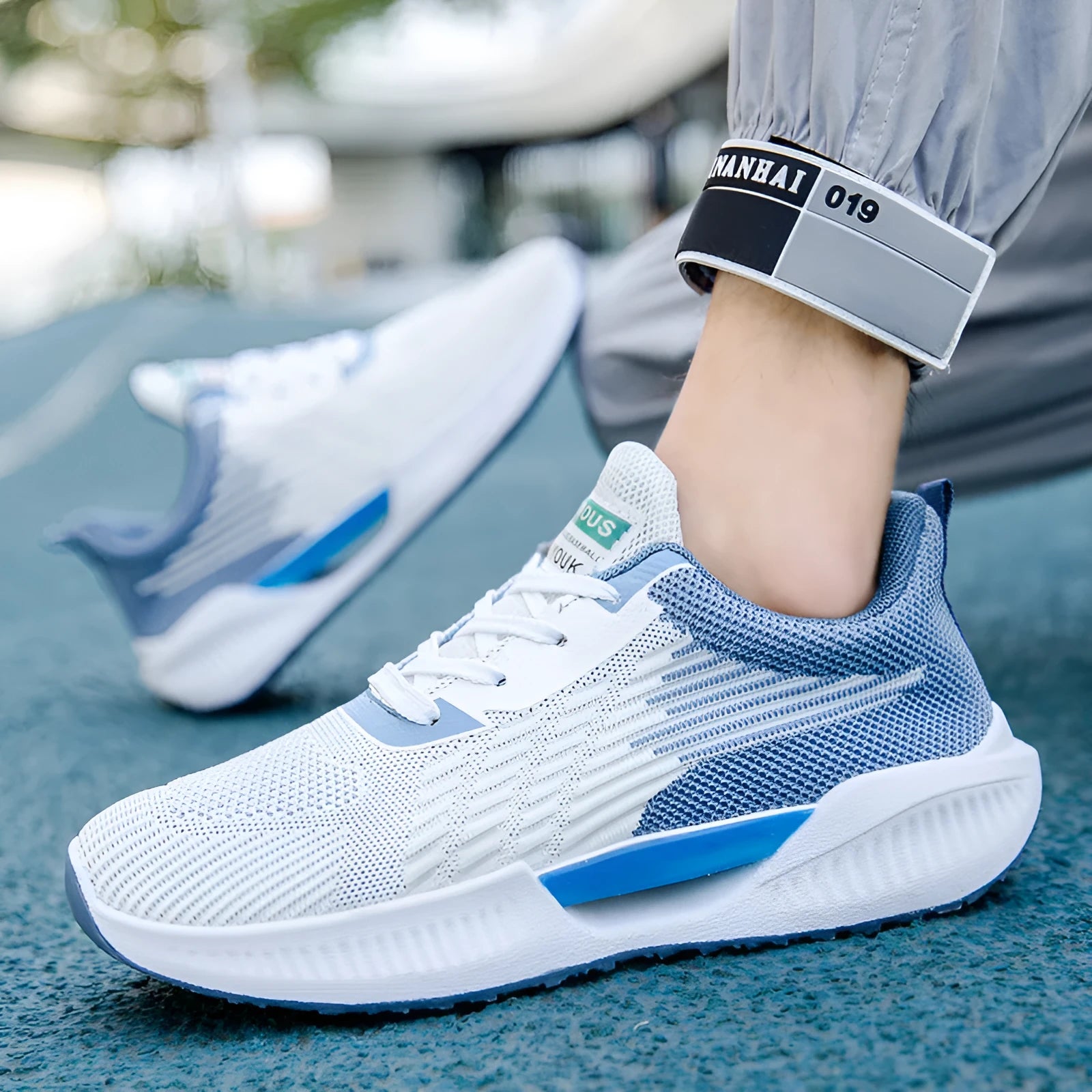 Men's blue casual sports mesh shoes with cloth upper and round toe on a wear-resistant plastic sole