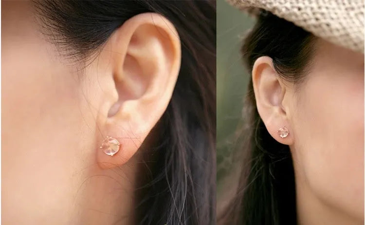 Women's rose gold plated silver earrings with synthetic quartz drop shape design