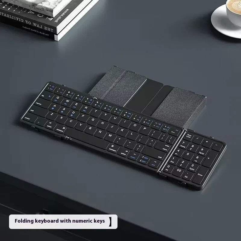 Black folding Bluetooth keyboard for mobile phones and tablets, shown both open and closed.