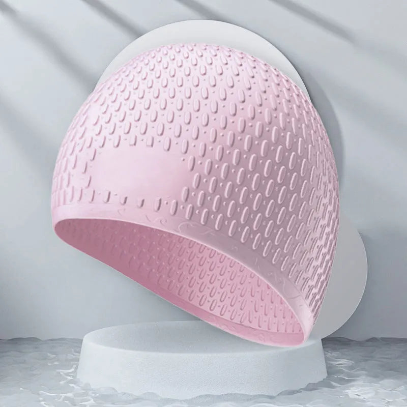 Solid colour silicone swimming cap for adults in one of nine available colours.