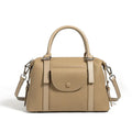 Women's genuine leather handbag in street-trend style with lock closure and contrast stitching