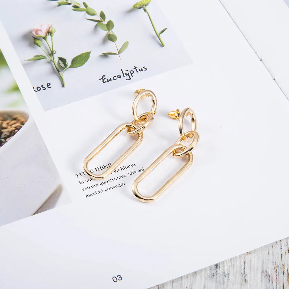Sterling silver colour geometric needle hoop earrings with ring and line design
