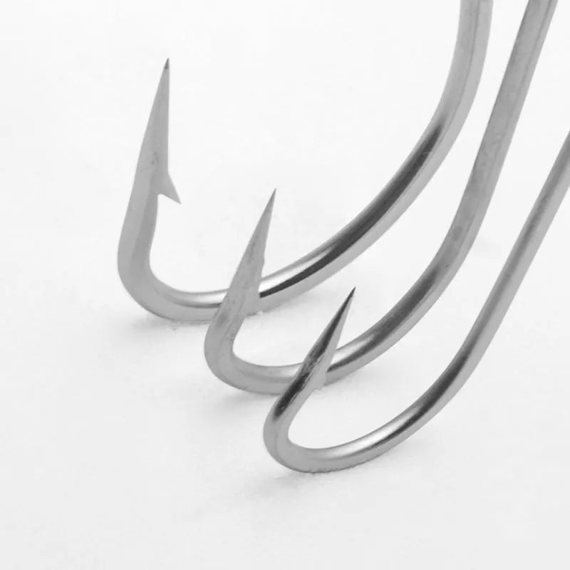 Assortment of stainless steel alloy sea fishing hooks in various styles for catching weever, snakehead, and seahorse.