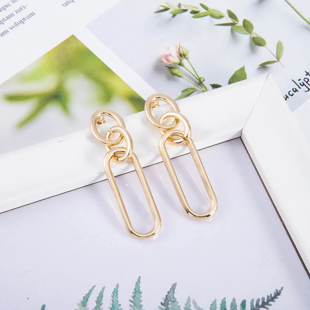 Sterling silver colour geometric needle hoop earrings with ring and line design