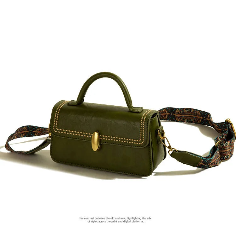 Women's retro brown messenger bag with square design showing sewing thread detailing and outer sandwich pocket