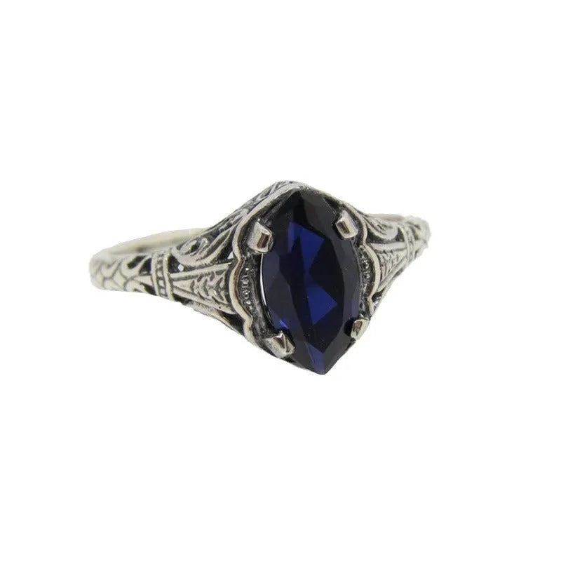 Silver women's ring with geometric hollow pattern and zircon stone on electroplated alloy
