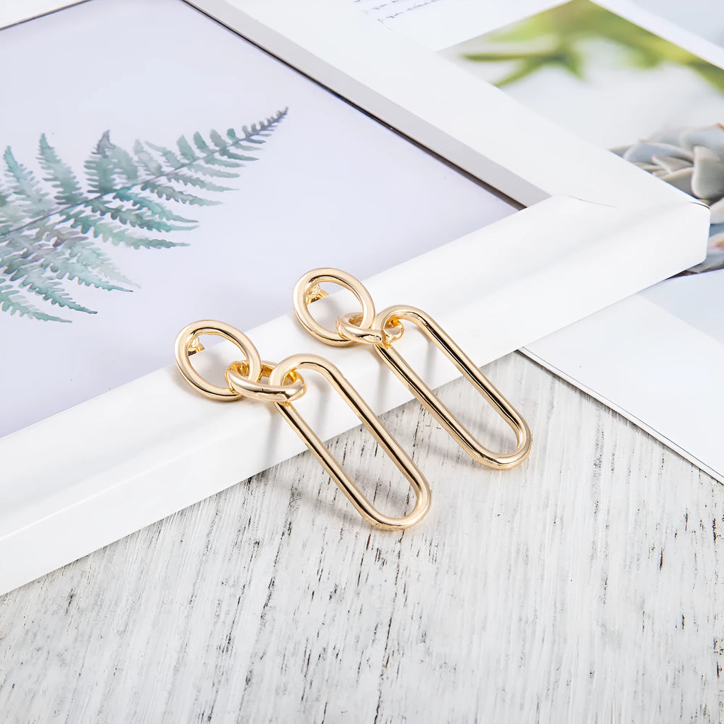 Sterling silver colour geometric needle hoop earrings with ring and line design