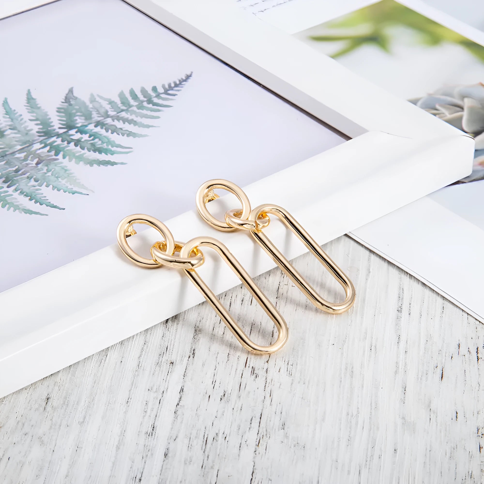 Sterling silver colour geometric needle hoop earrings with ring and line design