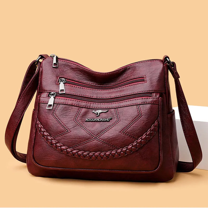 Soft PU leather women's crossbody shoulder bag in horizontal square shape with zippered pockets