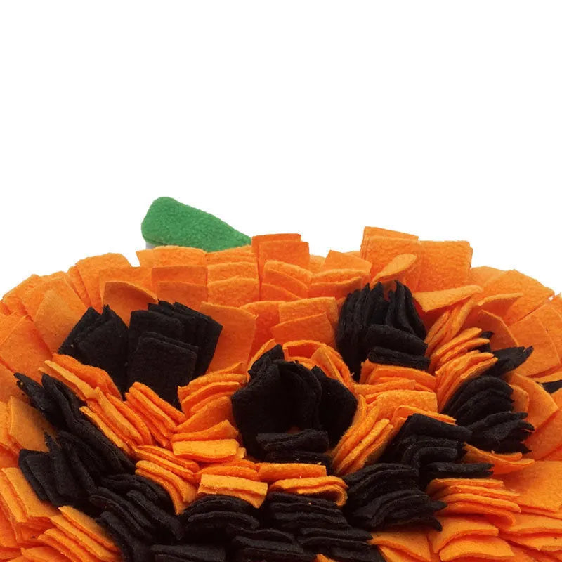 Orange pumpkin-shaped dog sniffing mat with removable pieces for slow feeding training