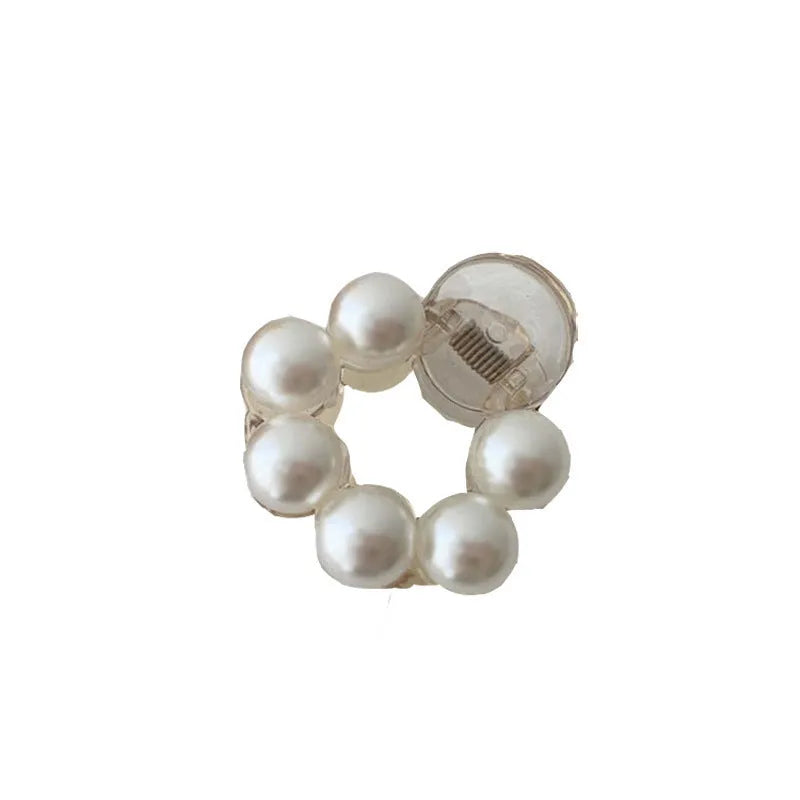 Women's pearl hair barrette in big pearl colour, manual finish, front view