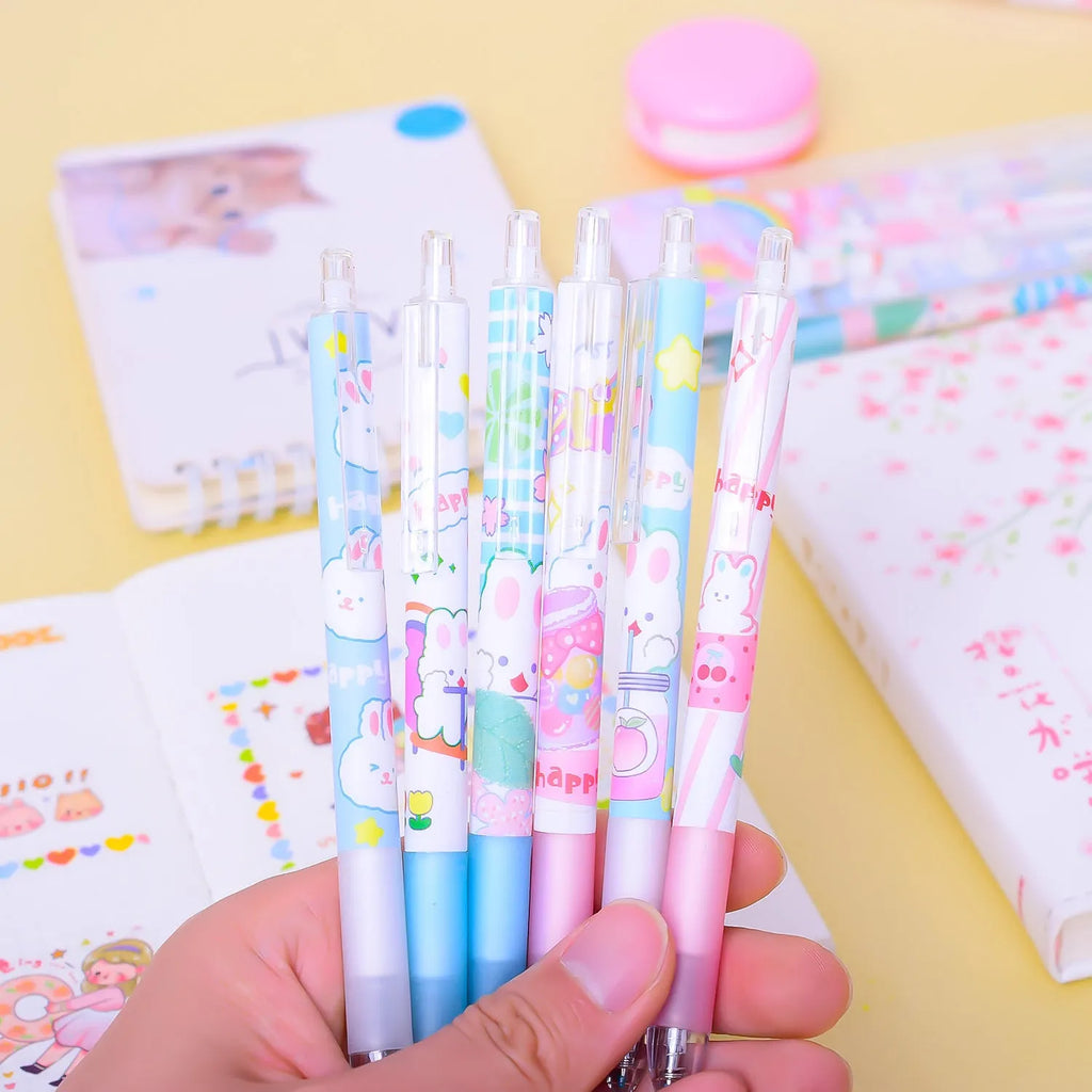 Six black plastic pens with cartoon bunny designs and 0.5mm tips laid side by side.