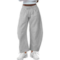 Women's loose cropped sweatpants with elastic waist and drawstring pockets in street fashion style