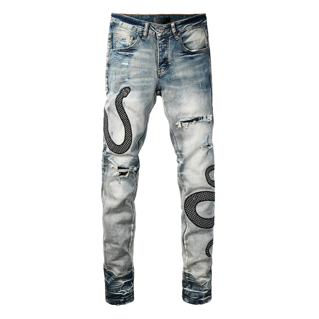 Blue distressed street fashion skinny jeans with a button fly and mid-rise waist on a hanger.