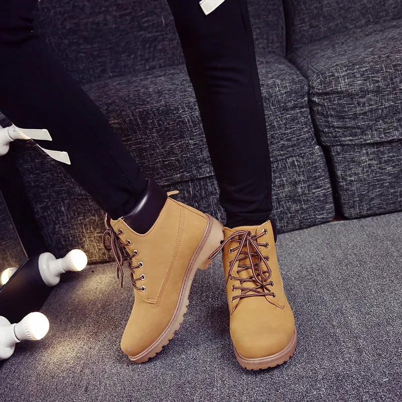 Pink men's Martin boots with velvet lining, flat bottom, and front lace-up design