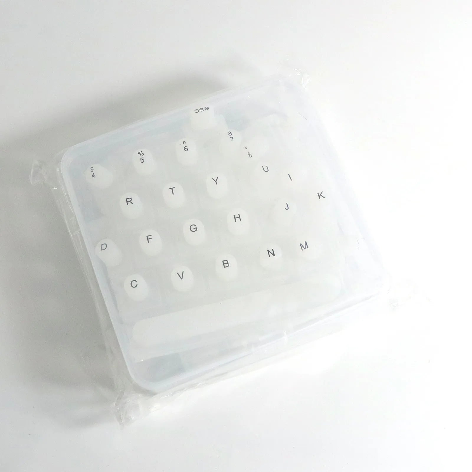 70 anti-static silicone keycaps for long nails in assorted colours including black, clear, mint green, pink, and purple
