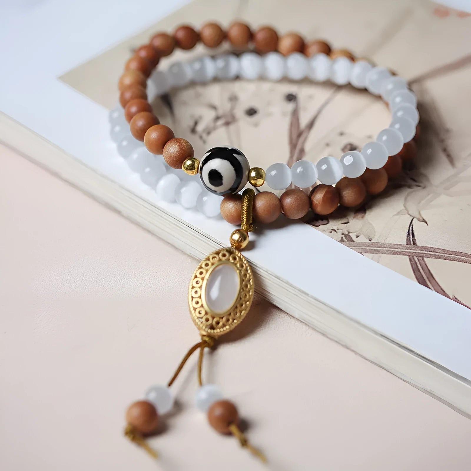 Sandalwood and opal Tibetan beads bracelet with polished double rings in Barbie colour