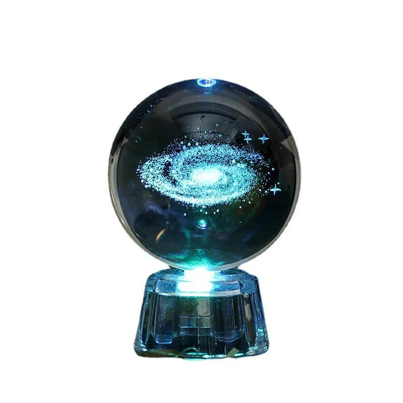 Transparent 6cm crystal ball ornament with inner carving on wooden table