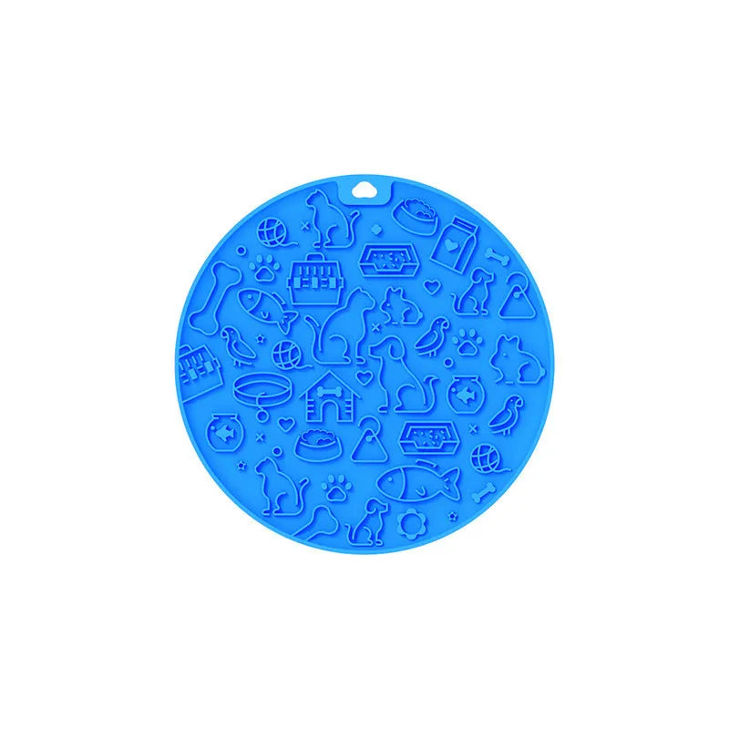 Round silicone pet lick mat in mint colour with suction cup on the underside